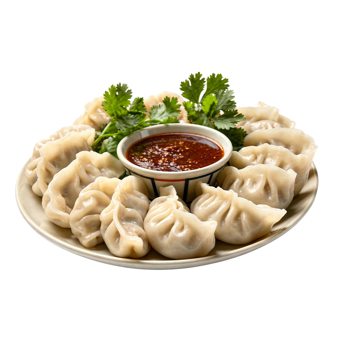 Veg Momos in a plate with chutney 
